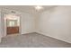 Carpeted bedroom leading to a bathroom area, providing comfort and convenience at 3500 N Hayden Rd # 1603, Scottsdale, AZ 85251