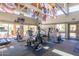 Bright community gym featuring treadmills and elliptical machines, with natural light and ample space at 3500 N Hayden Rd # 1603, Scottsdale, AZ 85251
