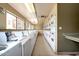 Bright laundry room with multiple washers and dryers at 3500 N Hayden Rd # 1603, Scottsdale, AZ 85251