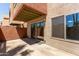 Private patio with stucco walls, sliding glass door and large window offer outdoor space at 3500 N Hayden Rd # 1603, Scottsdale, AZ 85251