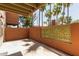 This patio area includes palm trees and privacy walls for a relaxing experience at 3500 N Hayden Rd # 1603, Scottsdale, AZ 85251