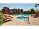 Scenic community pool and hot tub with comfortable lounge chairs and condo views at 3500 N Hayden Rd # 1603, Scottsdale, AZ 85251