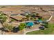 An aerial view of a playground and park within the community at 38115 W Excussare Way, Maricopa, AZ 85138