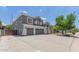 Inviting two-story home featuring a neutral color scheme, attached two car garage, and a well maintained yard at 4151 E Campbell Ave, Gilbert, AZ 85234