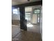 Open-concept foyer featuring elegant tile flooring, arched windows, and a sunlit front entry at 4151 E Campbell Ave, Gilbert, AZ 85234