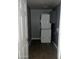Modern laundry area equipped with stacked washer and dryer units for space-saving convenience at 4151 E Campbell Ave, Gilbert, AZ 85234
