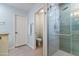 Modern bathroom with a walk-in shower and light neutral paint at 4611 E Red Bird Rd, Cave Creek, AZ 85331