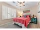 Comfortable bedroom with shutters and a colorful decor scheme at 4611 E Red Bird Rd, Cave Creek, AZ 85331