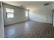 Bright bedroom features tile floors, enhancing space for versatile decor and comfortable living at 46922 W Coe St, Maricopa, AZ 85139