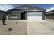 Charming single-story home featuring a well-maintained yard and an attached two-car garage at 46922 W Coe St, Maricopa, AZ 85139