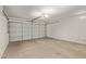 Spacious two car garage with automatic door and bright lighting at 5336 W Campo Bello Dr, Glendale, AZ 85308