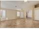Inviting living room with tiled floors, plantation shutters, and neutral color palette at 5336 W Campo Bello Dr, Glendale, AZ 85308