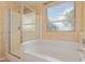 The main bathroom features a glass enclosed shower and a separate soaking tub at 5336 W Campo Bello Dr, Glendale, AZ 85308