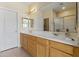 Spacious bathroom with double sinks, generous counter space, and a large mirror at 5415 E Mckellips Rd # 100, Mesa, AZ 85215