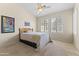 Cozy bedroom with neutral tones and plantation shutters for natural light at 5415 E Mckellips Rd # 100, Mesa, AZ 85215