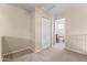 A secondary bedroom features neutral walls, carpeting, and an attached bathroom at 5415 E Mckellips Rd # 100, Mesa, AZ 85215