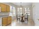 Bright breakfast nook with ample natural light and a charming chandelier at 5415 E Mckellips Rd # 100, Mesa, AZ 85215