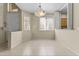 Dining area with tile floors, a modern light fixture, and lots of natural light at 5415 E Mckellips Rd # 100, Mesa, AZ 85215