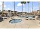 Inviting community pool and hot tub, complete with lounge chairs, providing the perfect place to unwind at 5415 E Mckellips Rd # 100, Mesa, AZ 85215