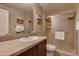 Bright bathroom featuring a single sink vanity and a glass-enclosed shower at 5450 E Deer Valley Dr # 1176, Phoenix, AZ 85054