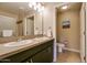 Bathroom featuring a double sink vanity and a separate water closet at 5450 E Deer Valley Dr # 1176, Phoenix, AZ 85054