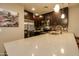 Well-equipped kitchen with stainless steel appliances and a spacious countertop with seating at 5450 E Deer Valley Dr # 1176, Phoenix, AZ 85054