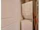 Efficient laundry area featuring a stacked washer and dryer for space-saving convenience at 5450 E Deer Valley Dr # 1176, Phoenix, AZ 85054