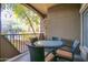 Inviting patio with stylish wicker seating and outdoor dining with views of the community at 5450 E Deer Valley Dr # 1176, Phoenix, AZ 85054