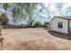 Large backyard features some natural landscaping at 6701 W Monterey Way, Phoenix, AZ 85033