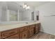 Spacious bathroom with tiled floors and vanity area at 6701 W Monterey Way, Phoenix, AZ 85033