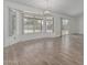Open floor plan dining room featuring new flooring and backyard views at 6701 W Monterey Way, Phoenix, AZ 85033