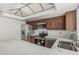Kitchen featuring marble countertops, stainless steel appliances, and undermount sink at 6701 W Monterey Way, Phoenix, AZ 85033