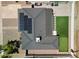 Aerial view showcasing solar panels, back patio area with putting green, artificial turf, and spacious backyard at 7320 E Pierce St, Scottsdale, AZ 85257