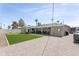 Large backyard with a covered patio, hot tub, putting green, and privacy at 7320 E Pierce St, Scottsdale, AZ 85257