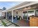Covered outdoor living area with comfortable seating and a view of the backyard at 7320 E Pierce St, Scottsdale, AZ 85257
