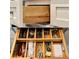 Customized drawer organizers provide efficient storage solutions for utensils and kitchen accessories at 7320 E Pierce St, Scottsdale, AZ 85257