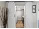 View of the laundry room with barn doors and additional counter space at 7320 E Pierce St, Scottsdale, AZ 85257