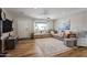 Spacious living room with large sectional couch and neutral color palette at 7320 E Pierce St, Scottsdale, AZ 85257