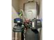 A water softener and water heater help maintain the home's plumbing systems at 7320 E Pierce St, Scottsdale, AZ 85257