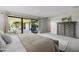 Spacious main bedroom with sliding glass doors leading to a covered patio at 7615 E Tucson Rd, Scottsdale, AZ 85258
