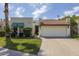 Single-story home with a tile roof and green awnings, showcasing a simple, well-maintained exterior at 7714 N 17Th Pl, Phoenix, AZ 85020