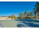 Active community basketball court with well-maintained surface, hoops, and attractive landscaping at 8061 E Glenrosa Ave, Scottsdale, AZ 85251