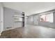 Bright living room with new wood floors, neutral gray paint, and lots of light at 8061 E Glenrosa Ave, Scottsdale, AZ 85251