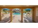 Community pool view highlighting shaded lounge chairs and multiple building access from a shaded patio at 8061 E Glenrosa Ave, Scottsdale, AZ 85251
