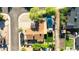 Aerial view of property featuring a pool, outdoor living area, mature trees and neighborhood street at 8502 E Malcomb Dr, Scottsdale, AZ 85250