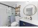 Bathroom featuring modern fixtures, a glass-enclosed shower, and stylish vanity with sink at 8502 E Malcomb Dr, Scottsdale, AZ 85250