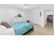 A well-lit bedroom featuring a large window, closet, and comfortable bedding at 8502 E Malcomb Dr, Scottsdale, AZ 85250