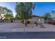 Inviting single-level home showcasing a well-kept yard with desert-style landscaping at 8502 E Malcomb Dr, Scottsdale, AZ 85250