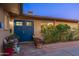 Welcoming front entrance with double doors and charming flower pots at 8502 E Malcomb Dr, Scottsdale, AZ 85250