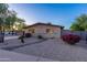 Charming home with desert landscaping and well-maintained flower beds at 8502 E Malcomb Dr, Scottsdale, AZ 85250